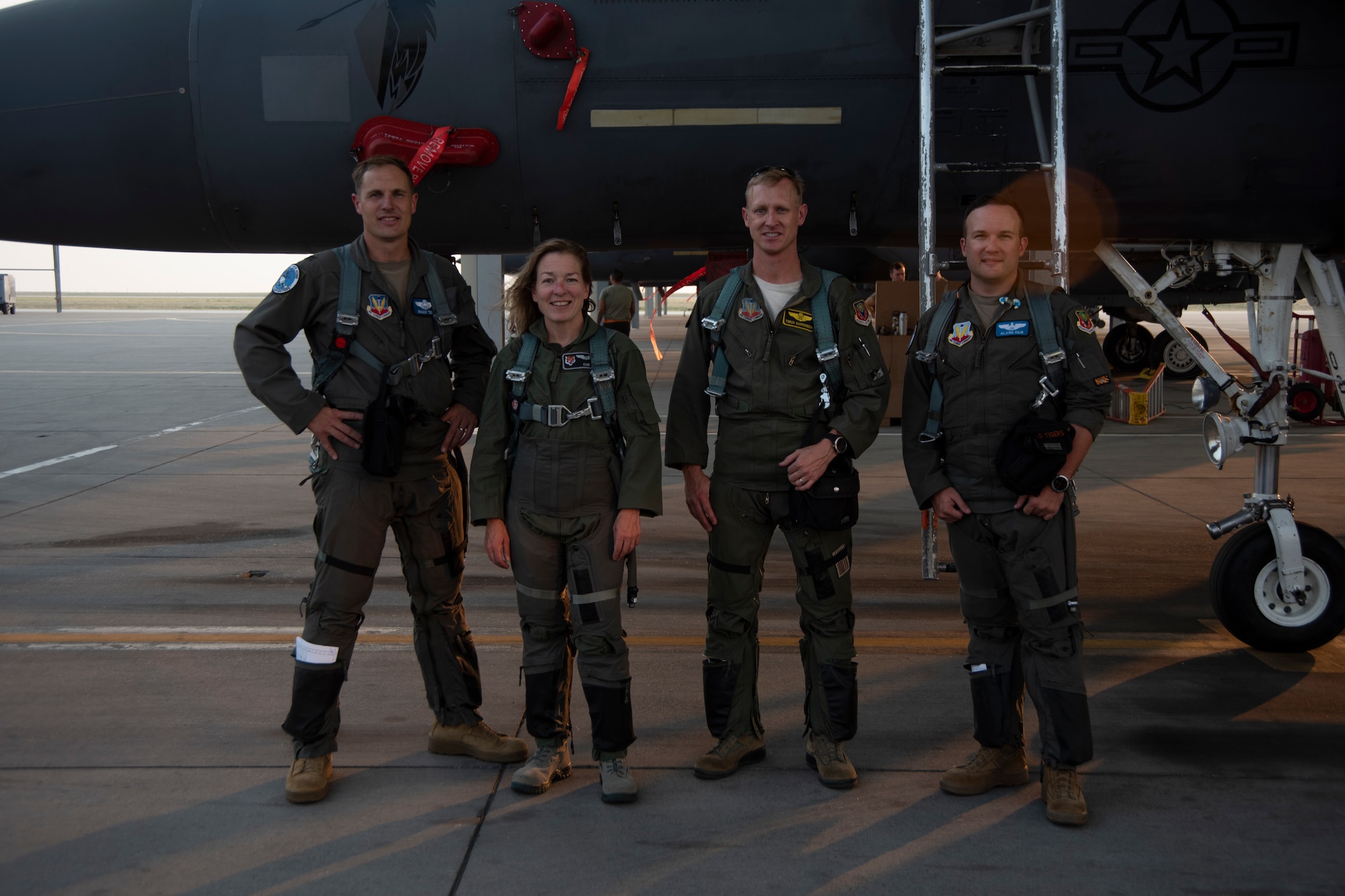 The Boise Mayor pose for a photo with Air Force pilots.