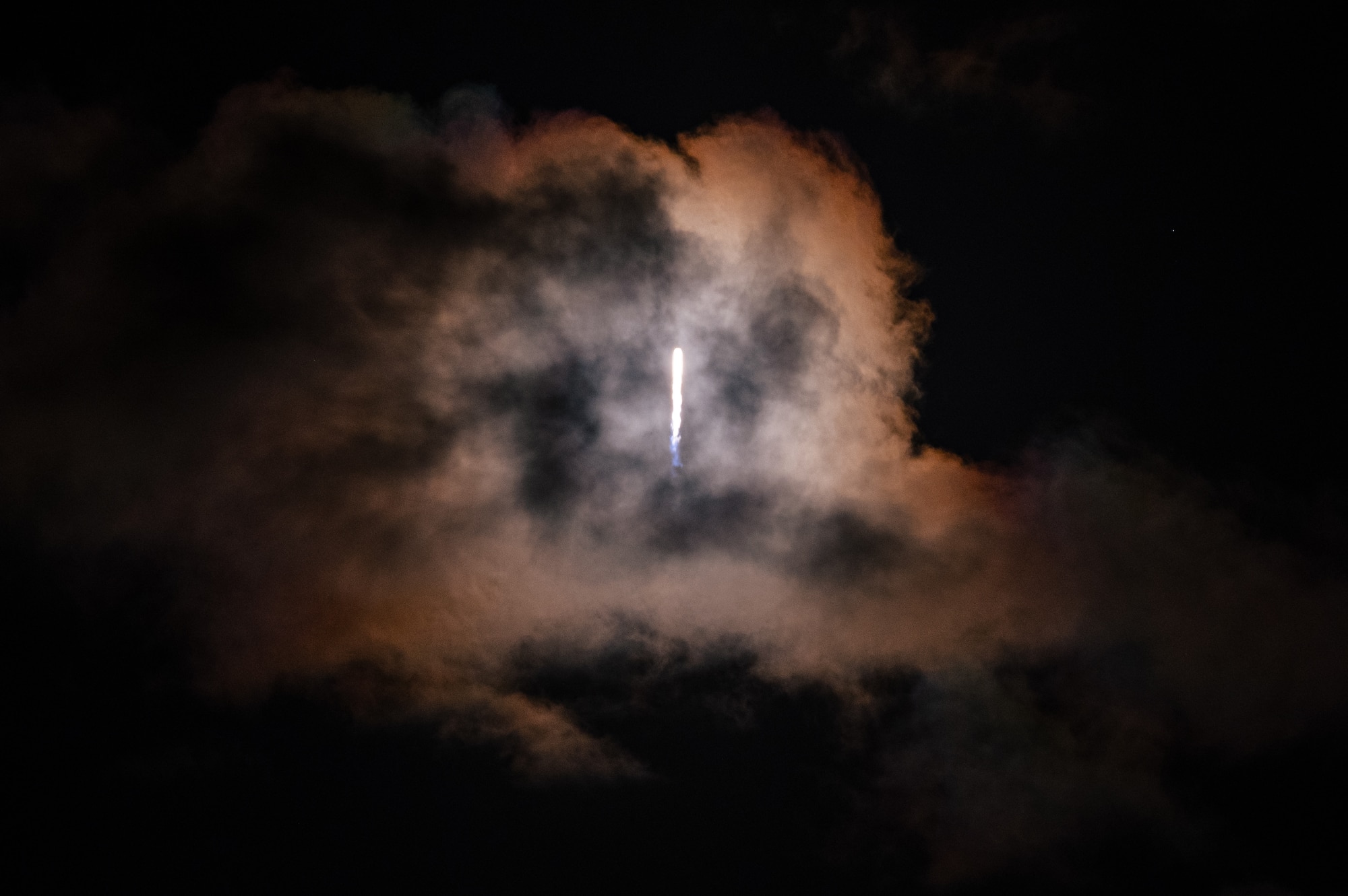 A Falcon 9 rocket launches Inspiration4 toward space Sept. 15, 2021, at Kennedy Space Center, Florida. Four private citizens were transported into orbit inside Space-X’s Dragon Resilience capsule. The crew, which is the first to be made up exclusively by private citizens, will orbit the Earth for three days. (U.S. Space Force photo by Airman 1st Class Thomas Sjoberg)