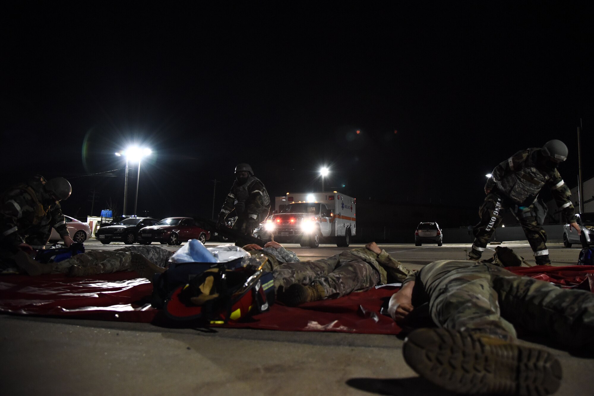 Emergency Responders from the 51st Civil Engineer Squadron and 51st Medical Group help simulated injured Airmen during a training event