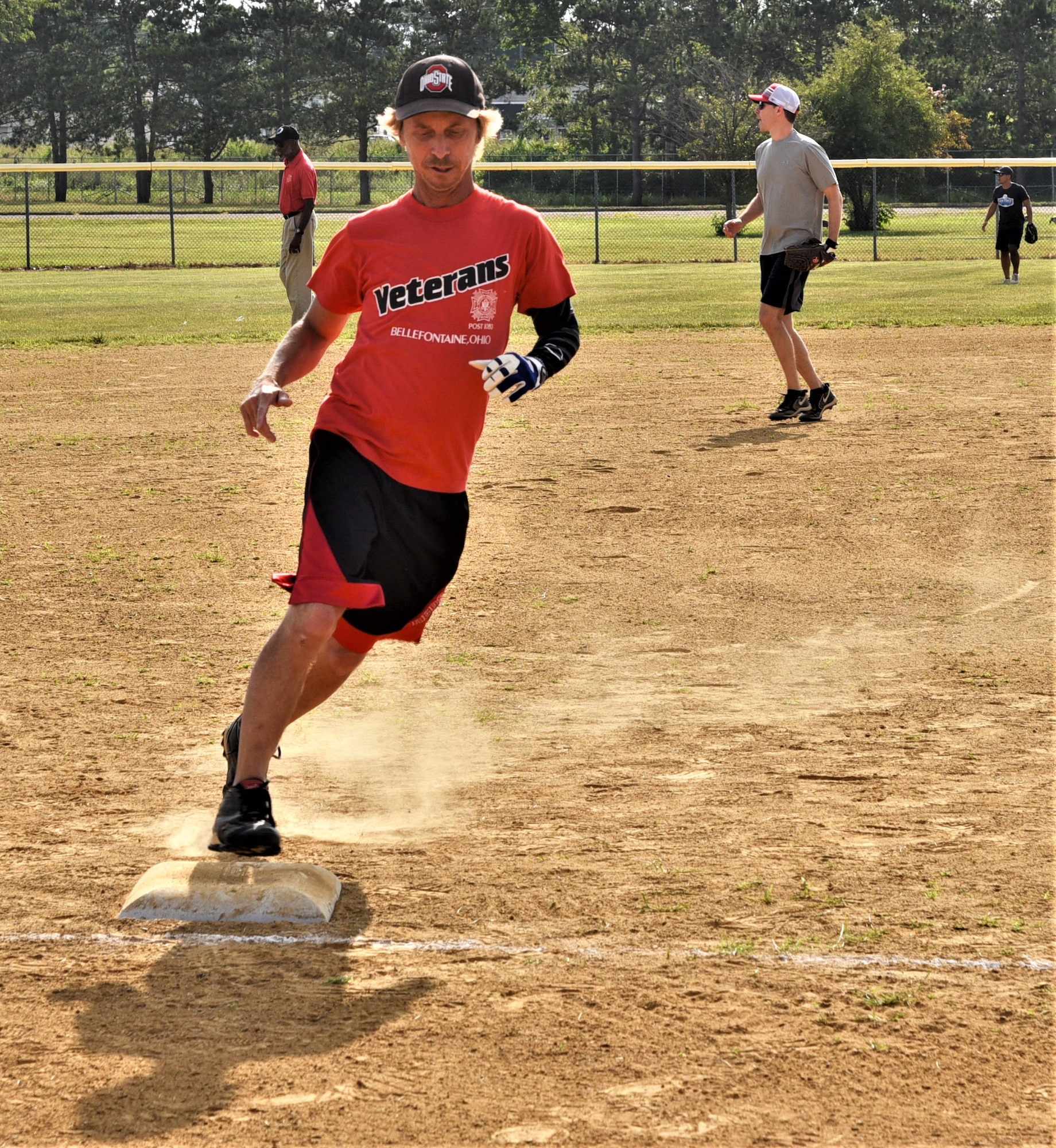 Younger James Delong rounds third base