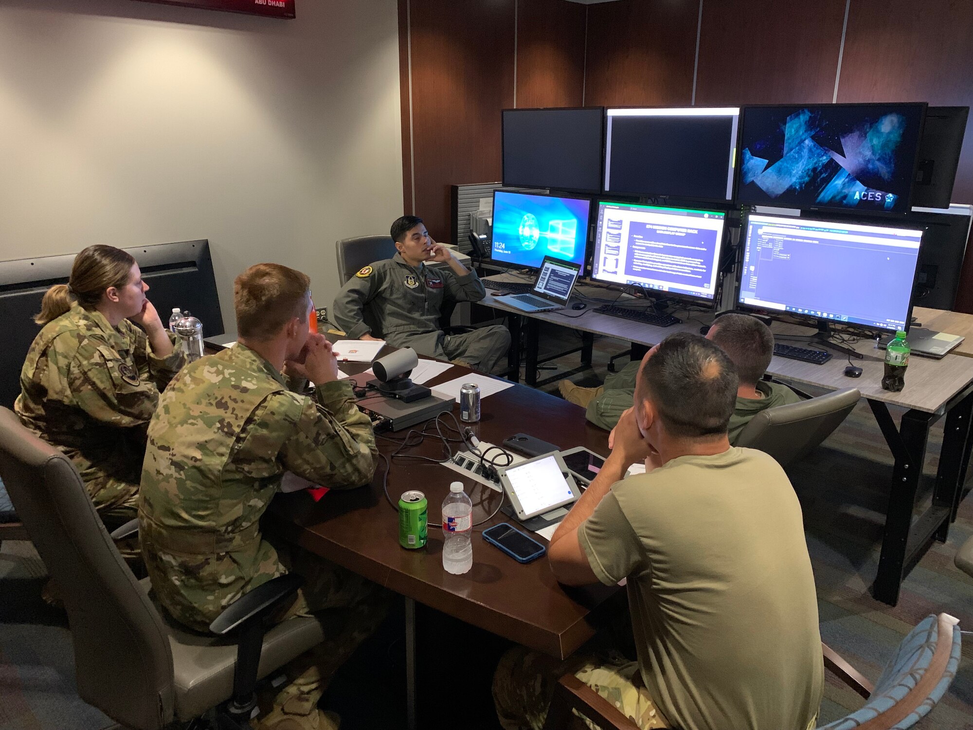 Airmen in a briefing room.