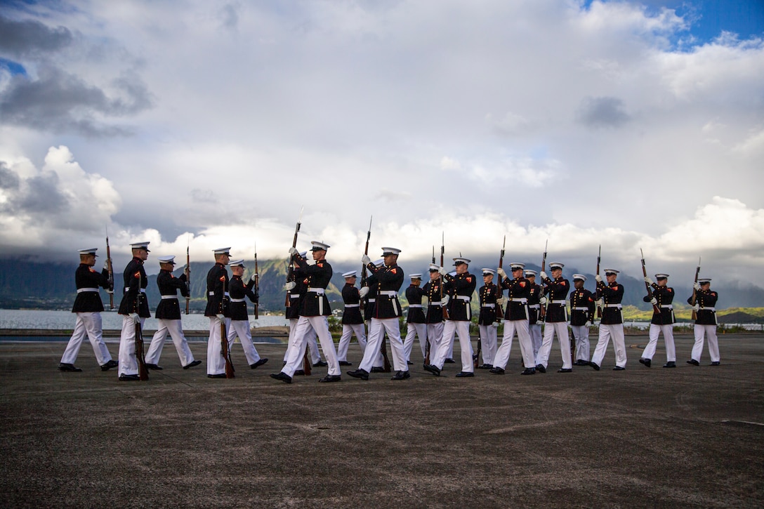 Marines with the Silent Drill Platoon perform on the flight line at Marine Corps Base Hawaii, Sept. 10, 2021.