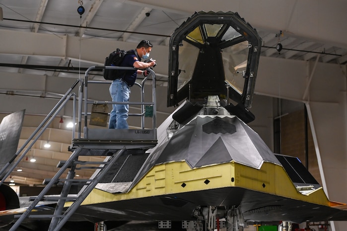 Lt. Col.(ret) Mark Sung, Taiwan Air Force, looks into the cockpit of an F-117 Nighthawk while visiting Hill Aerospace Museum Sept. 16, 2021, at Hill Air Force Base, Utah. The museum is offering special programs and exhibits during Top of Utah Museum Week, which runs through Sept. 18. (U.S. Air Force photo by Cynthia Griggs)