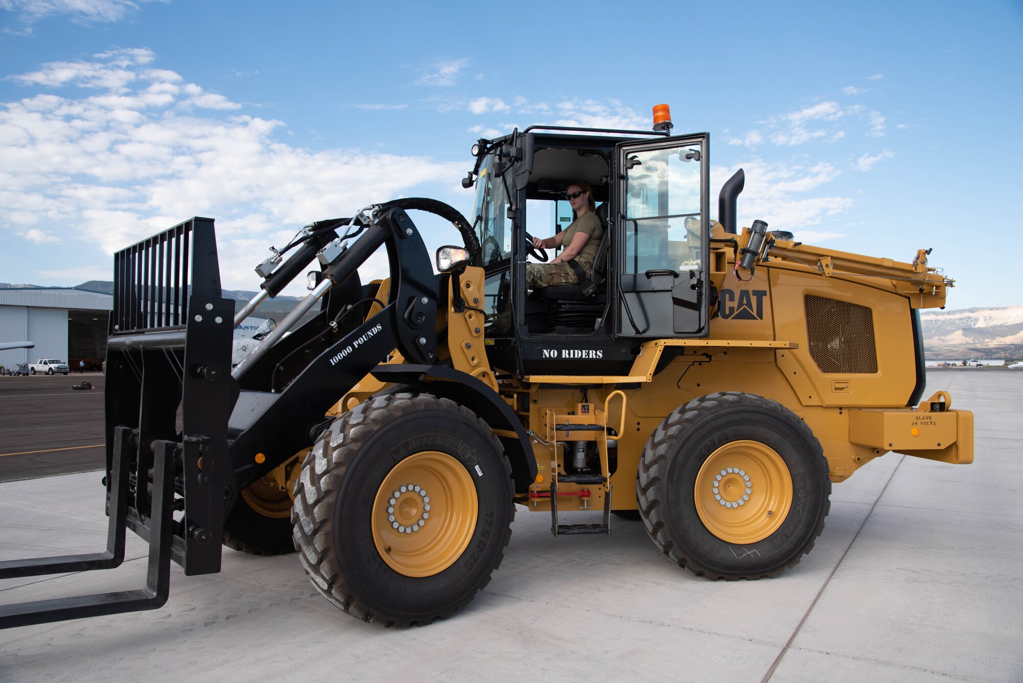 Staff Sgt. Ashliynd Shepard, 934th Aircraft Maintenance Squadron, Minneapolis-St. Paul Air Reserve Station, Minnesota, learns how to drive a forklift as part of the Multi-Capable Airman Training Sept. 13, 2021. Active-duty Air Force, Air National Guard and Reserve Citizen Airmen gathered at Rifle-Garfield County Airport, Rifle, Colorado to take part in the 22nd Air Force’s flagship exercise Rally in the Rockies Sept. 12-17, 2021. The exercise is designed to develop Airmen for combat operations by challenging them with realistic scenarios that support a full spectrum of operations during military actions, operations or hostile environments.