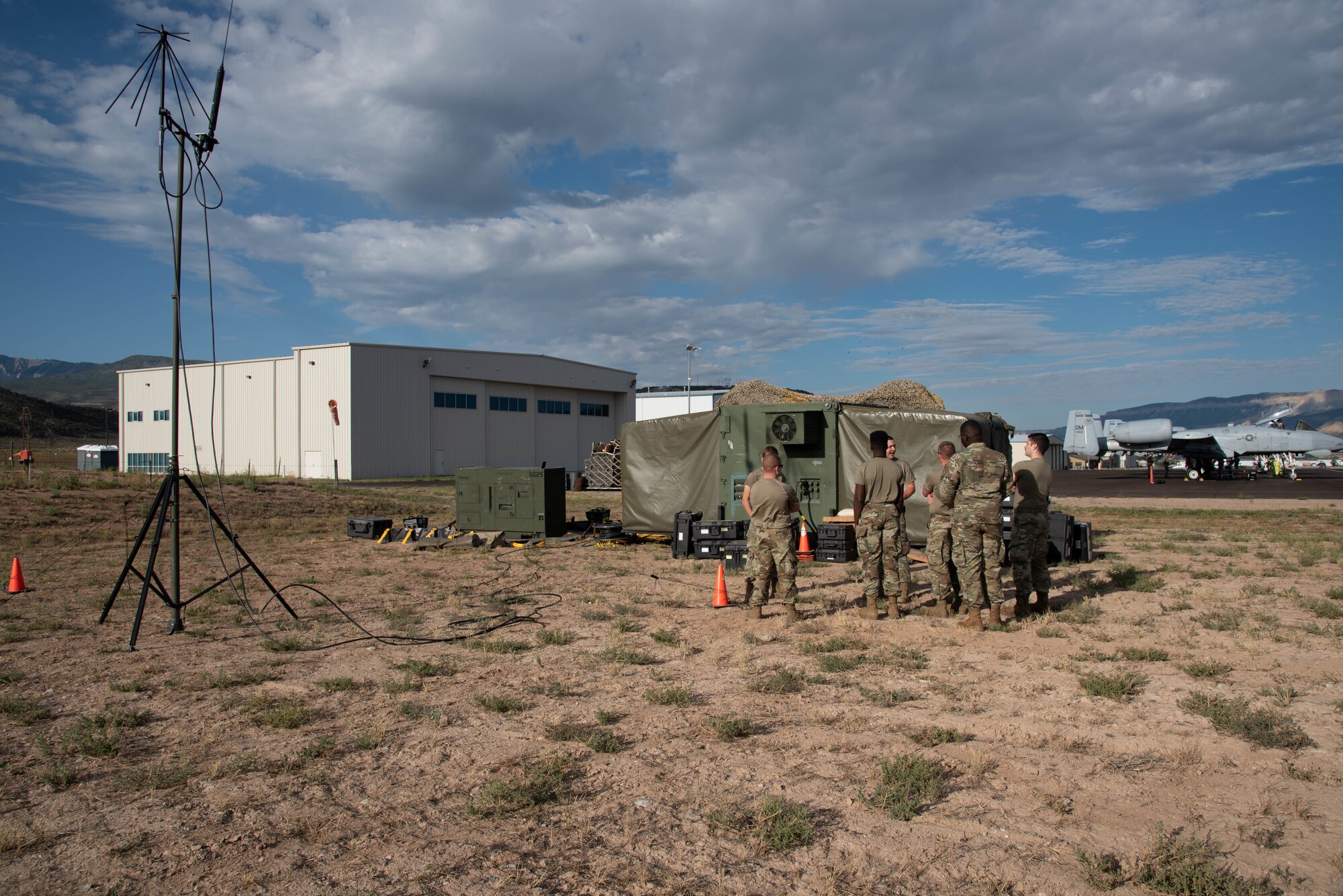 Active-duty Air Force, Air National Guard and Reserve Citizen Airmen gathered at Rifle-Garfield County Airport, Rifle, Colorado to take part in the 22nd Air Force’s flagship exercise Rally in the Rockies Sept. 12-17, 2021. Airmen from the Contingency Response Group with the 123rd Airlift Wing, Kentucky Air National Guard, train Airmen on radio communicaition. The exercise is designed to develop Airmen for combat operations by challenging them with realistic scenarios that support a full spectrum of operations during military actions, operations or hostile environments.