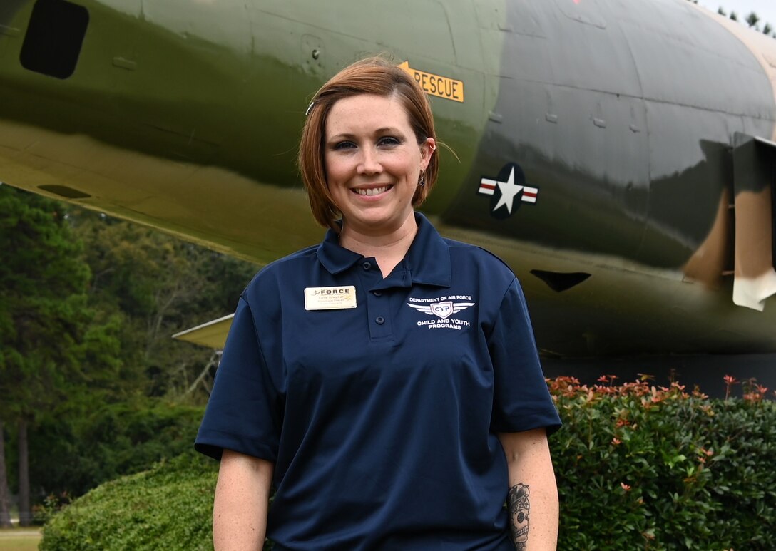 Team Shaw civilian poses for photo