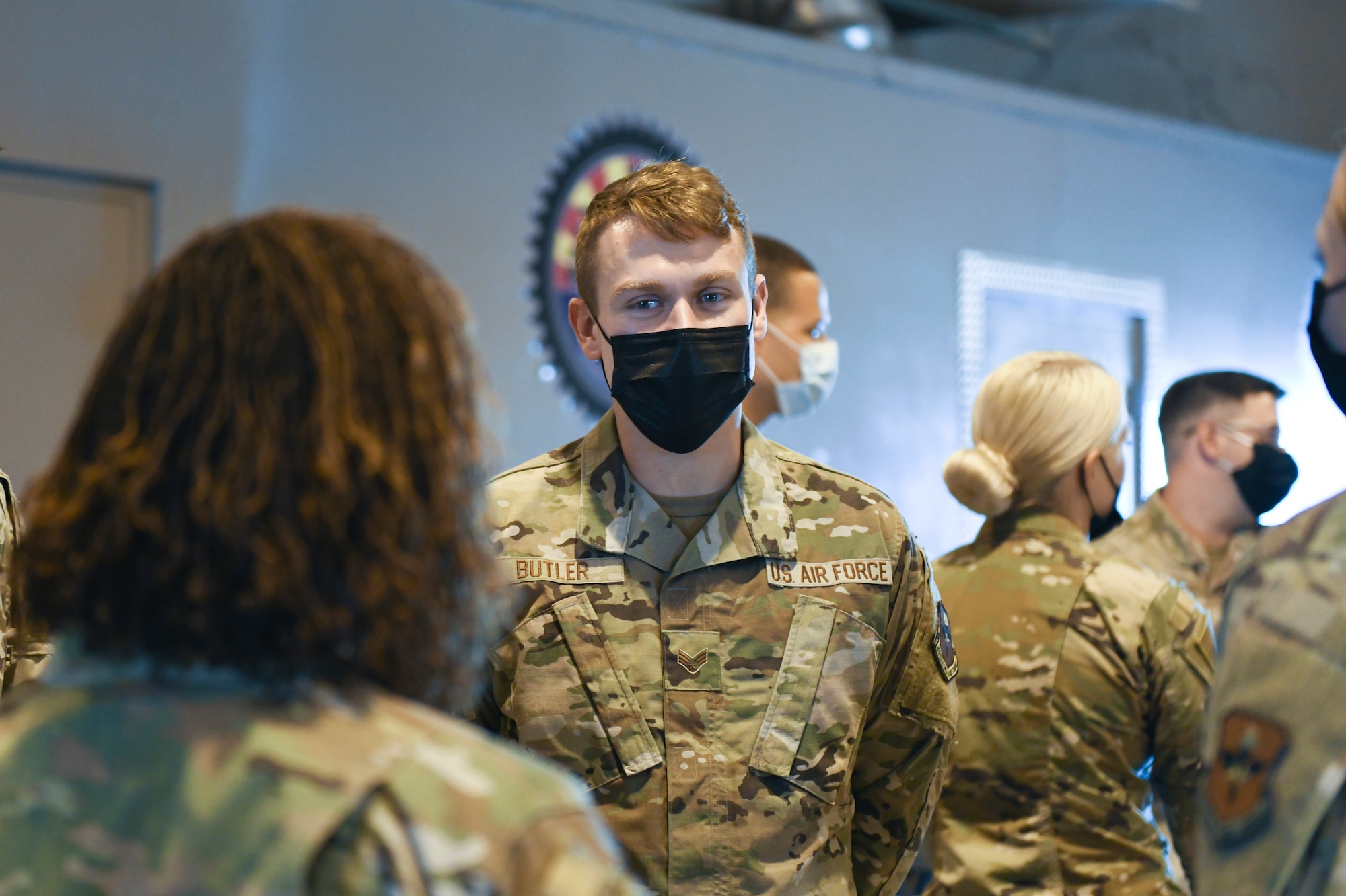 U.S. Air Force Senior Airman Caleb Butler, 56th Fighter Wing public affairs specialist, speaks with 56th Comptroller Squadron leadership as he prepares for his deployment Sept. 13, 2021, at Luke Air Force Base, Arizona. More than 40 Airmen deployed to Joint Base McGuire-Dix-Lakehurst, New Jersey, in support of Operation Allies Welcome, the largest noncombatant evacuation operation in United States history. Luke Airmen rapidly mobilized to answer the call for support with less than a five-day notice to assist with the sheltering of thousands of Afghan evacuees from Kabul, Afghanistan. (U.S. Air Force photo by Tech. Sgt. Amber Carter)