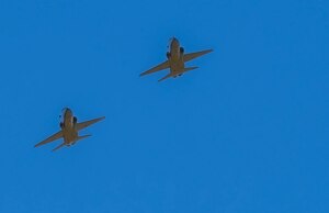 Two T-38 Talons from the 416th Flight Test Squadron, 412th Test Wing, Edwards Air Force Base, California perform a flyover in honor of retired U.S. Air Force Col. Robert F. Waggoner, during a memorial service at Bishop, California, Sept. 12. (Air Force photo by Danny Bazzell)