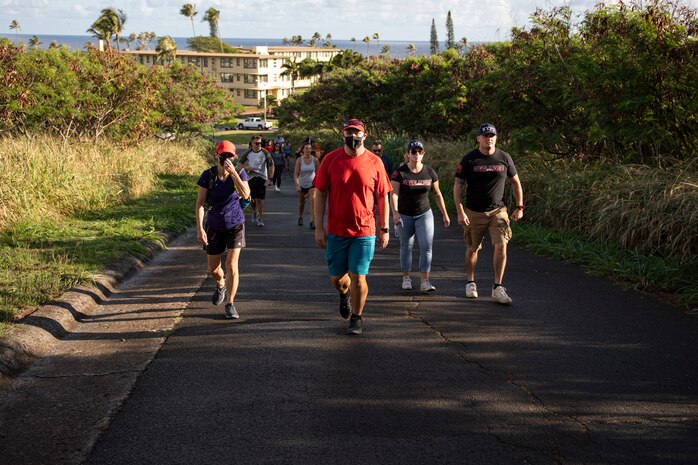 U.S. military service members and civilians participate in the 9/11 Remembrance Walk aboard Marine Corps Base Hawaii, Sept. 11, 2021. Patrons from MCBH got together to recognize the20th anniversary of the Sept. 11th attacks. (U.S. Marine Corps photo by Lance Cpl. Terry Stennett)