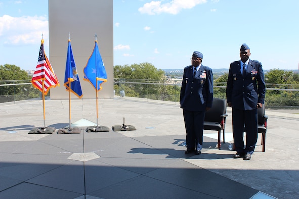 Retired Maj. Gen. Alfred K. Flowers, Sr. (left), the longest-serving Airman, stands next to his son, Brig. Gen. Alfred K. Flowers, Jr., Air Force Medical Service Manpower, Personnel and Resources director, during Flowers, Jr.’s promotion ceremony at the Air Force Memorial in Arlington, Va., Sept. 7, 2021.