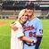 Capt. Griffin Jax, Minnesota Twins pitcher, hugs his wife, Savannah, at his Major League Baseball debut in Kansas City, Missouri, June 5, 2021.