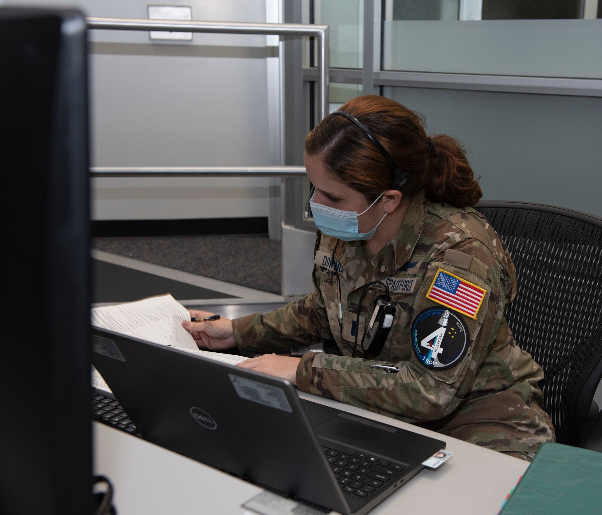 U.S. Space Force 1st Lt. Ascheleigh Downum, 1st Range Operations Squadron range operations commander instructor, confirms traffic control points are in place in support of the Inspiration4 launch Sept. 15, 2021, inside the Morrell Operations Center at Cape Canaveral Space Force Station, Florida. The MOC supports every space launch from CCSFS and Kennedy Space Center. (U.S. Space Force photo by Tech. Sgt. James Hodgman)