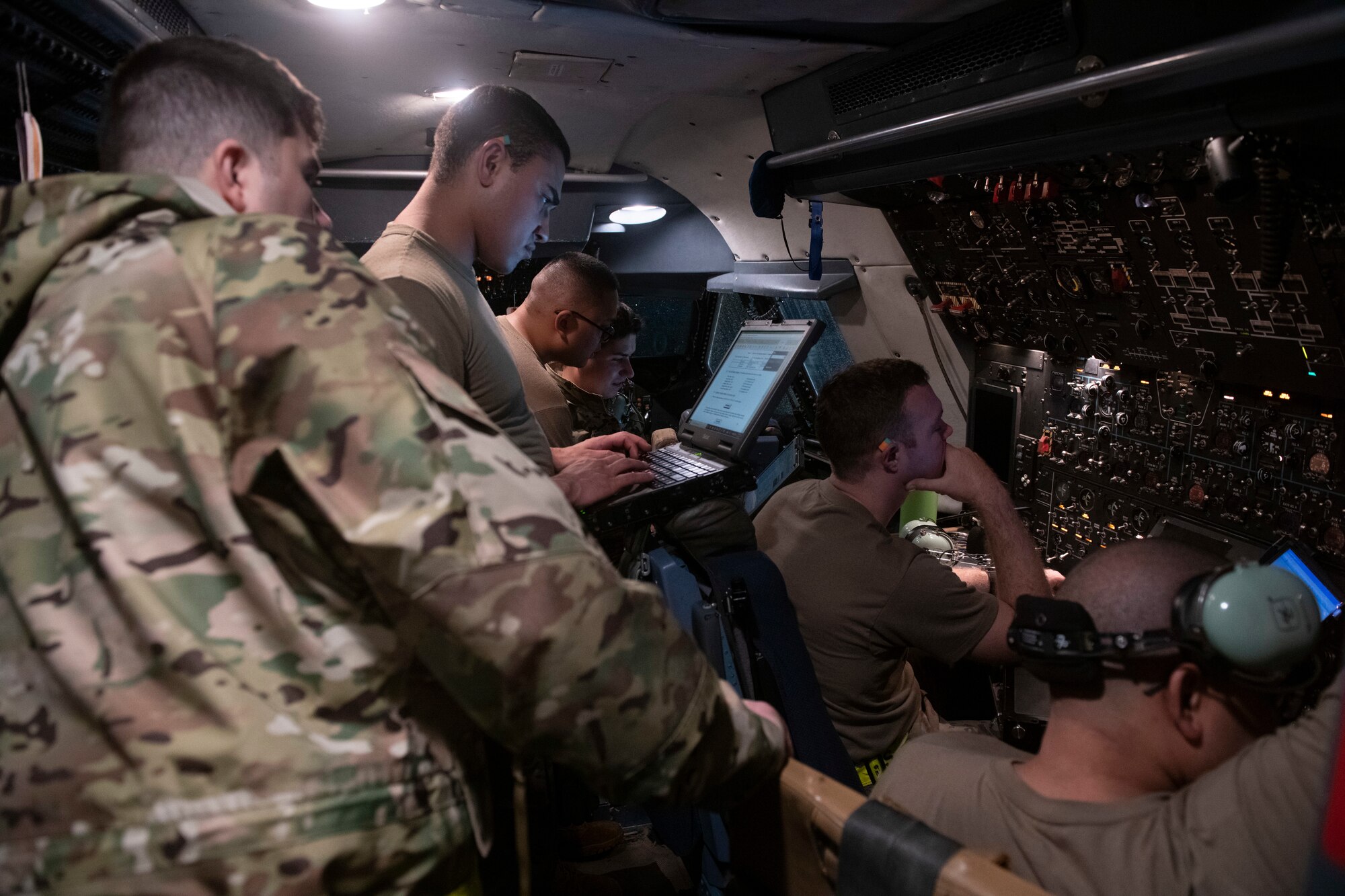 730th Air Mobility Squadron members learn about fuel control on a C-5M Super Galaxy at Yokota Air Base, Japan, Sept. 15, 2021. The 730th AMS was able to acquire a C-5M from Travis Air Force Base in Fairchild, California, to use for familiarization training. (U.S. Air Force photo by Staff Sgt. Joshua Edwards)
