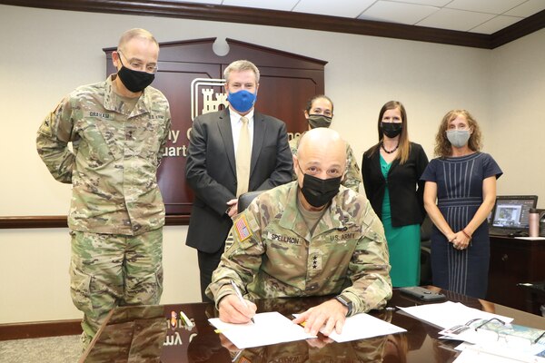 Lt. Gen. Scott A. Spellmon, commanding general, signs the Chief’s Report for the San Juan Metro Area Coastal Storm Risk Management (CSRM) Study. The signing of this report marks a crucial milestone and progresses the proposed project to Congress for individual authorization. (USACE photo)