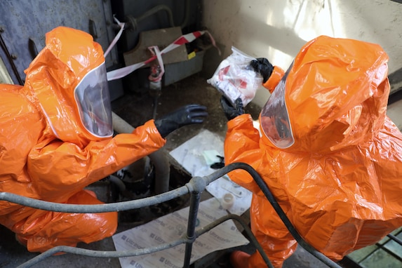 U.S. Army Reserve Soldiers with the 773rd Civil Support Team, 7th Mission Support Command, based out of Kaiserslautern, Germany, prepare to take samples of a chemical substance during a training scenario mission held at exercise Toxic Valley 2021 in Zemianske Kostoľany, Slovakia, Sept. 14, 2021. Toxic Valley is a Slovac Armed Forces-led live agent chemical, biological, radiological, nuclear exercise that provides training for multinational military CBRN units stationed throughout Europe. (U.S. Army Reserve photo by Master Sgt. Joy Dulen, 7th Mission Support Command)