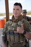 New York Army National Guard Cpl. Dakoatah Miller takes a break during the Army National Guard Best Warrior competition at Florence Military Reservation, Arizona, July 20, 2021. Miller, a member of the 2nd Battalion, 108th Infantry Regiment, will be attending the special international class at the Brazilian Jungle Warfare Training Center.