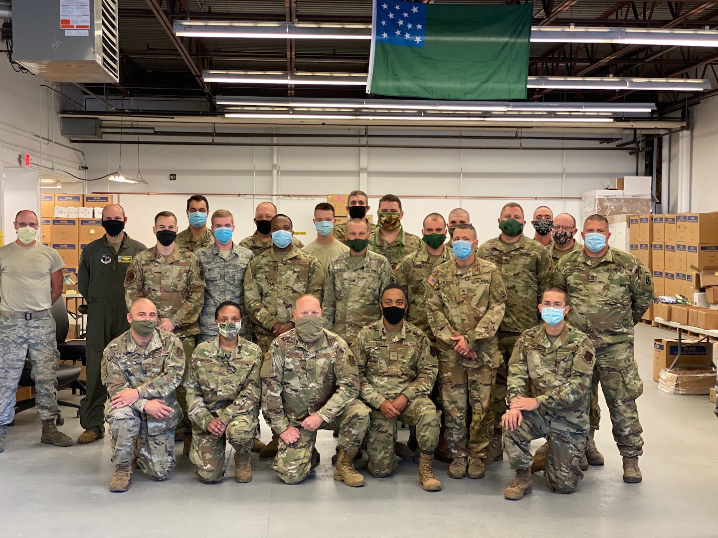 Members of the Vermont National Guard at the Vermont Medical Countermeasures Warehouse Sept. 18, 2020. Guard members continue to work at the site in September 2021, distributing COVID-19 vaccines and personal protective equipment throughout Vermont.