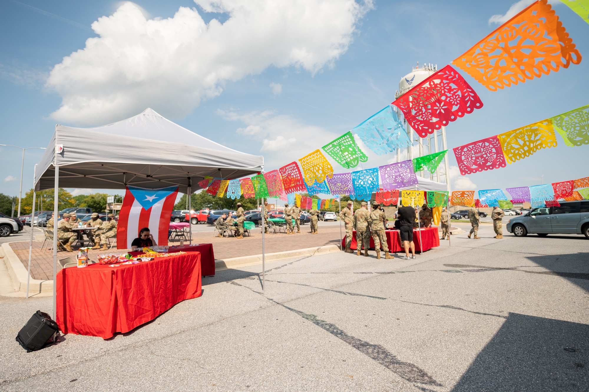 Members of Team Dover attend the Hispanic Heritage Month Block Party on Dover Air Force Base, Delaware, Sept. 15, 2021. National Hispanic Heritage Month is observed from Sept. 15 to Oct. 15 in recognition and celebration of Latin American history and culture. (U.S. Air Force photo by Mauricio Campino)