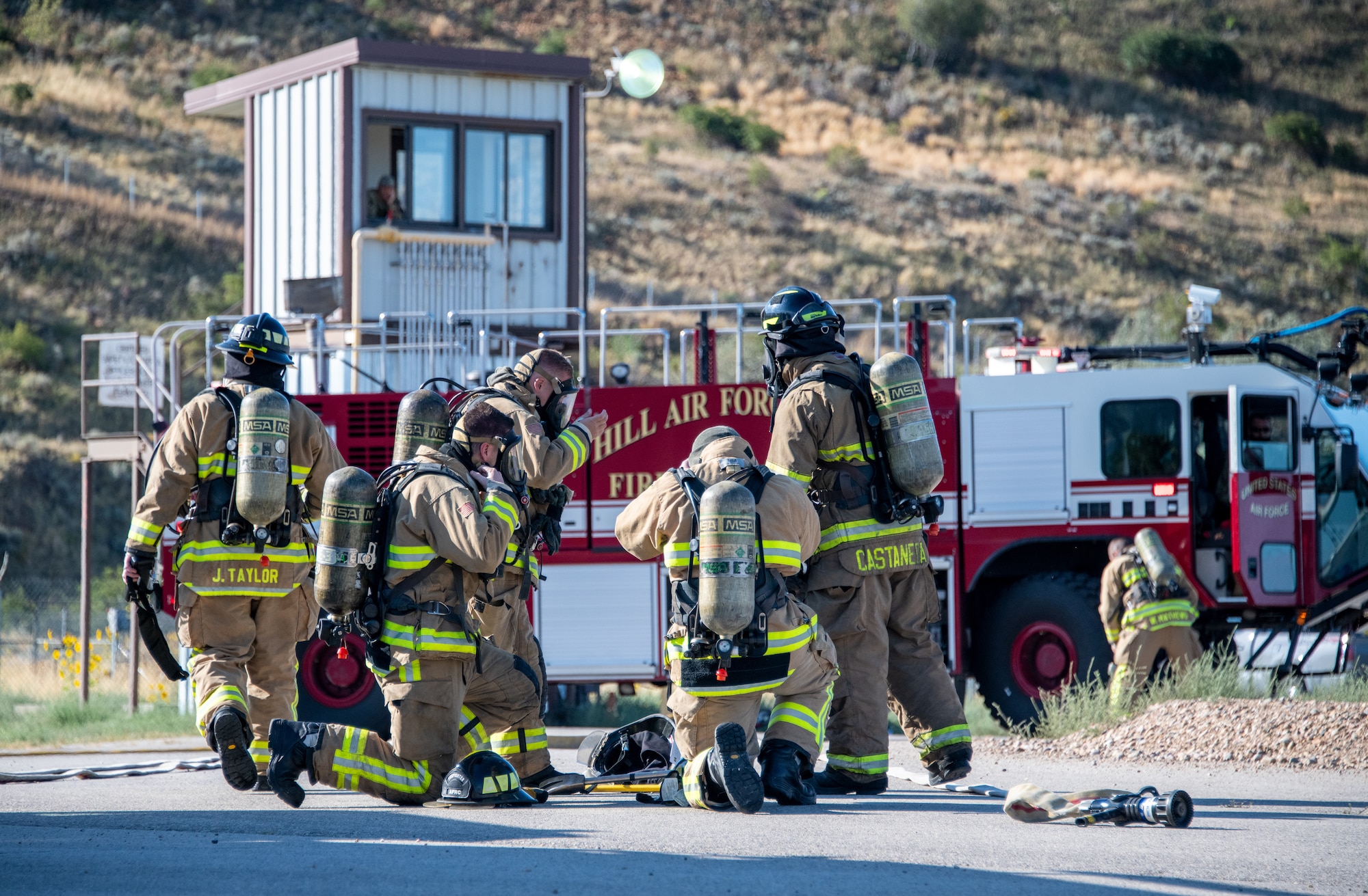 Reserve firefighters from the 419th Civil Engineer Squadron respond to an aircraft live-fire burn at Hill Air Force Base, Utah