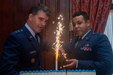 U.S. Air Force Maj. Gen. Randolph J. Staudenraus, director of strategy, policy, plans and international Affairs (J-5), National Guard Bureau, assists as youngest member in attendance, Air National Guard 2nd Lt. Brendan Coble, a budget officer with the 111th Attack Wing headquartered at Biddle Air National Guard Base in Horsham, Pennsylvania, in cutting the cake during a 74th Air Force birthday celebration hosted by and held at the Union League of Philadelphia, Sept. 15, 2021. This year, the Air Force celebrates more than seven decades as a military component.