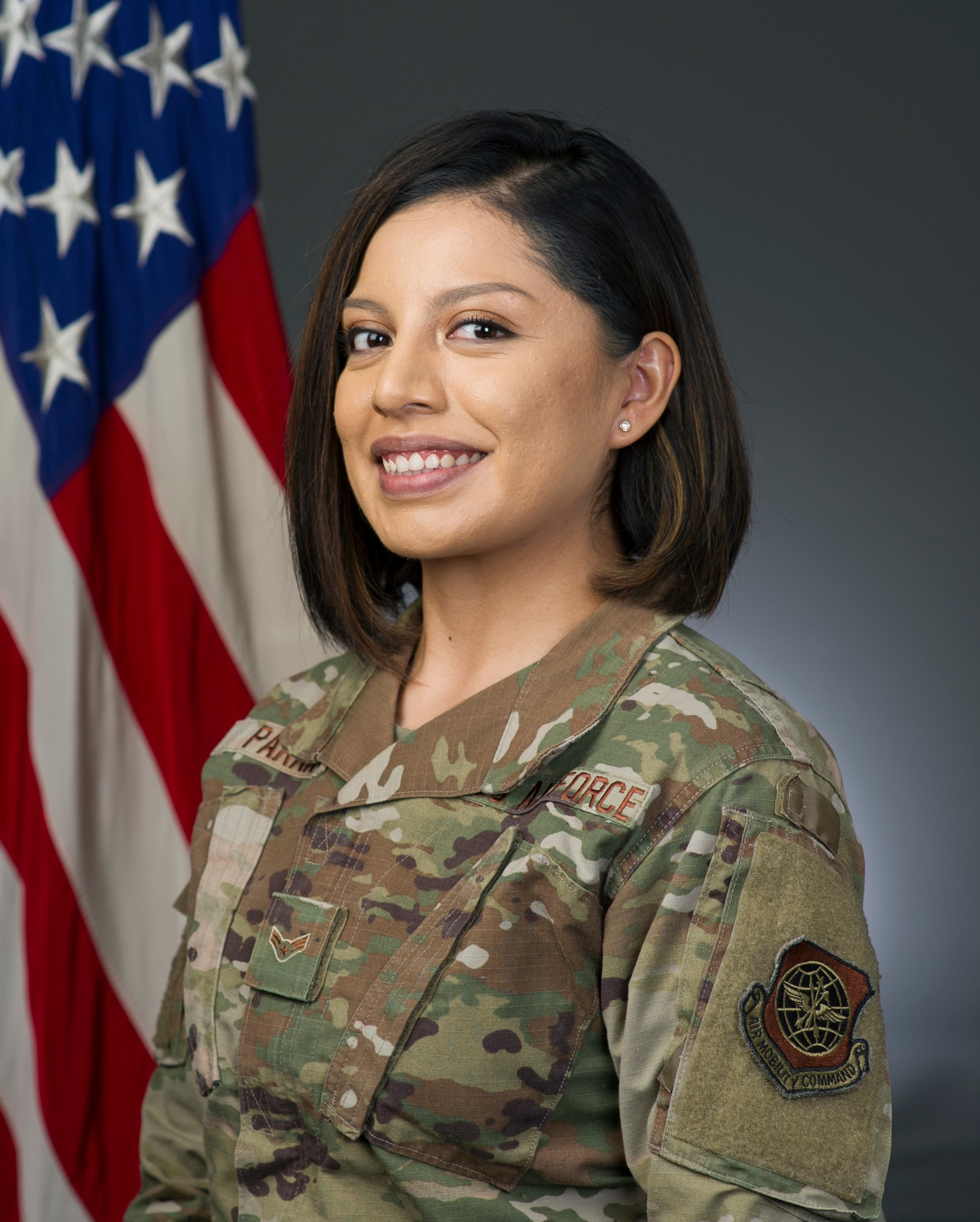 U.S. Airman 1st Class Karla Parra, 60th Air Mobility Wing broadcast journalist, poses for a photo