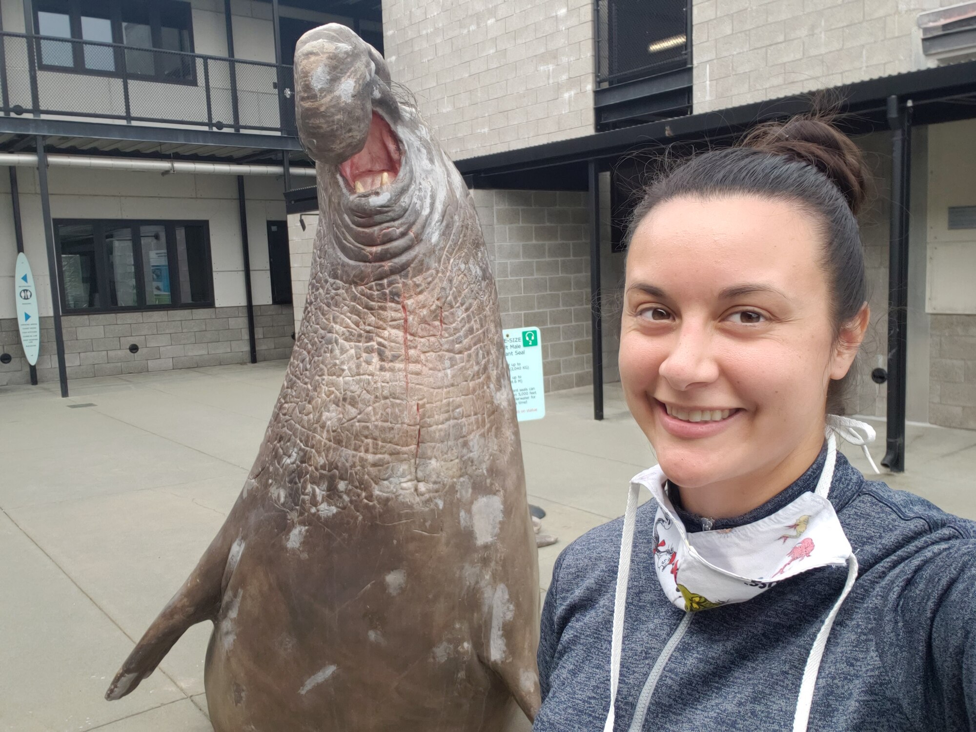 Christine Rodriguez with a seal statue