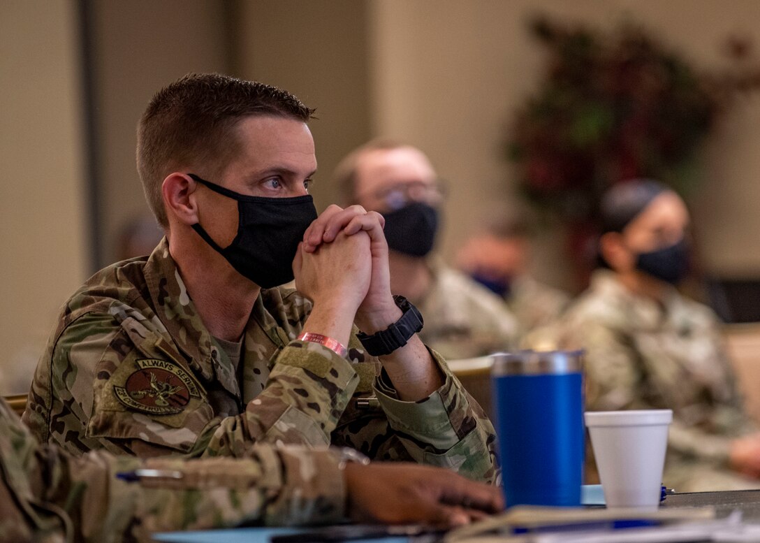 A commander listens to a brief