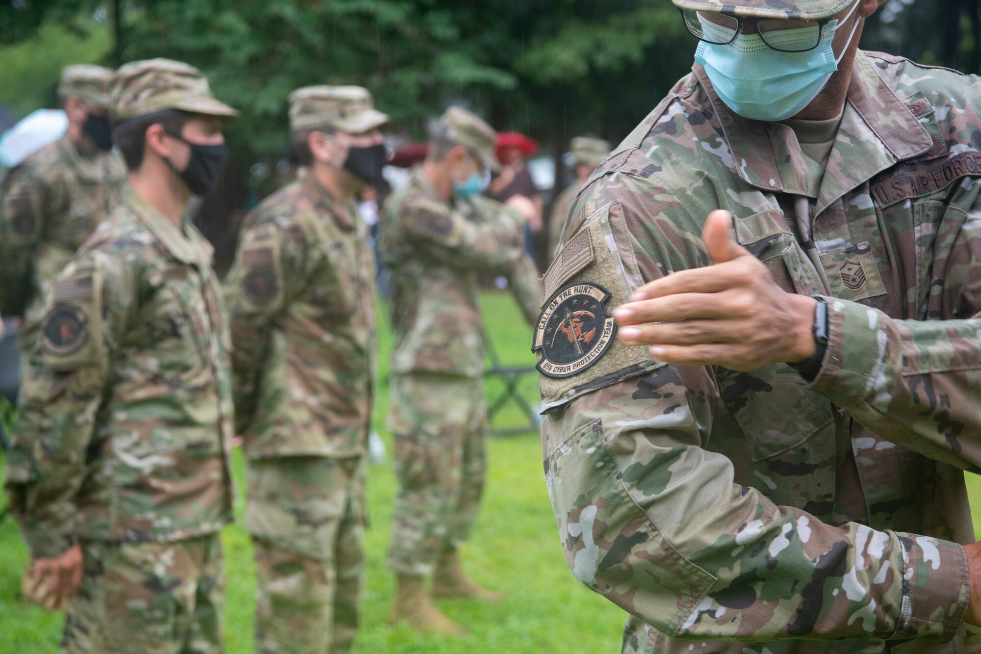 Virginia Air National Guard members from the 185th Cyberspace Operations Squadron ceremoniously removed their 185th COS bat patch, replacing it with the 856th Cyber Protection Team patch during send-off ceremonies Aug. 7, 2021, at Joint Base Langley-Eustis, Virginia.