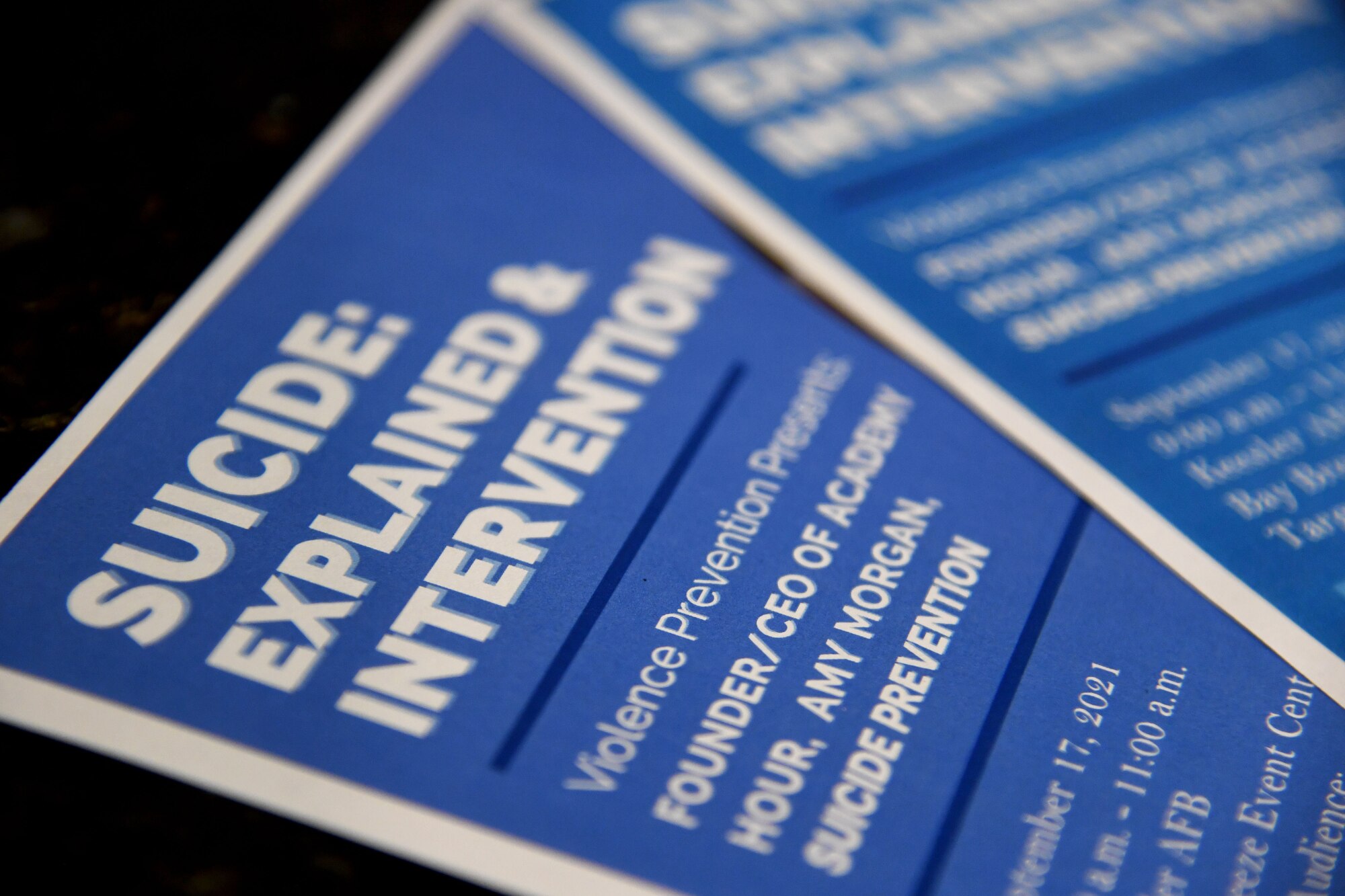 Flyers are on display during the Suicide Explained & Suicide Intervention training inside the Bay Breeze Event Center at Keesler Air Force Base, Mississippi, Sept. 17, 2021. With suicide being the leading cause of death in the Air Force, the presentation focus was to provide skill based training in primary prevention for personnel at Keesler. (U.S. Air Force photo by Kemberly Groue)