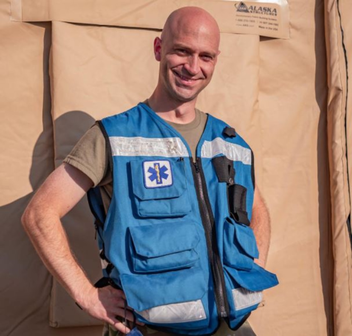 Photo By Airman 1st Class Madelyn Keech | U.S. Air Force Capt. Spencer Carrier, 86th Operational Medical Readiness Squadron physical therapist, stands in Pod one at Ramstein Air Base, Germany, Sep. 4, 2021. Carrier spends his time outside of work with his church to prepare food for evacuees and their families and also collects donations to pay for clothes, diapers and toys to donate to evacuees in support of Operation Allies Refuge. (U.S. Air Force photo by Airman Jared Lovett)