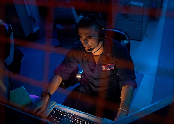 210917-N-YS413-5069 TAIWAN STRAIT (Sept. 17, 2021) Fire Controlman (Aegis) 3rd Class Thomas Tecchio, from Norwood, N.J., stands the spy radar system control watch aboard Arleigh-burke class guided missile-destroyer USS Barry (DDG 52) as it transits the Taiwan Strait during a routine transit, Sept. 17. Barry is forward-deployed to the 7th Fleet area of operations in support of a free and open Indo-Pacific. (U.S. Navy photo by Mass Communication Specialist 3rd Class Justin Stack)"