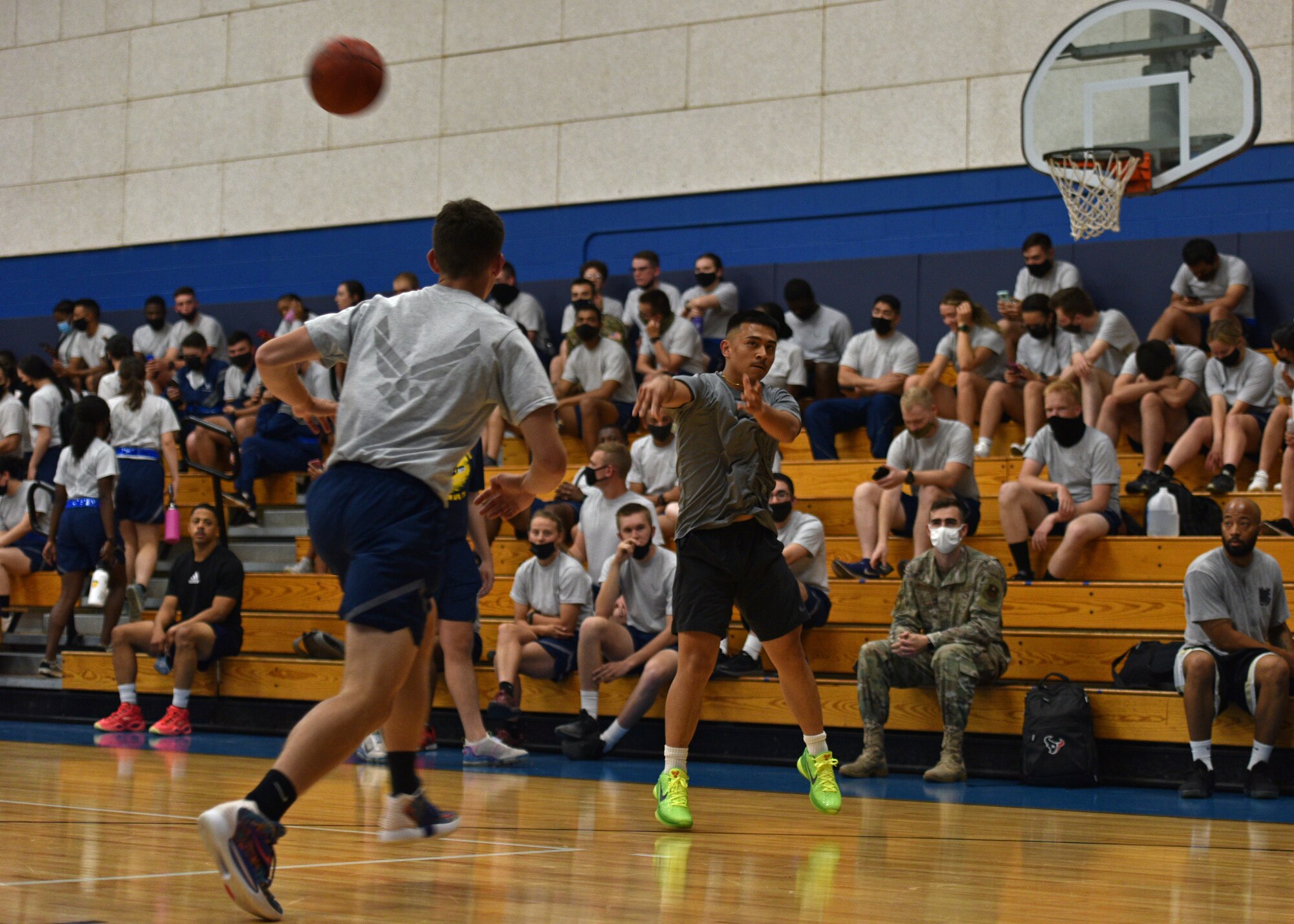 Members of the base community participate in a three versus three basketball game during Wing Sports Day on Goodfellow Air Force Base, Texas, Sept. 17, 2021. A total of 18 participants played in the basketball portion of the Wing Sports Day. (U.S. Air Force photo by Senior Airman Ashley Thrash)