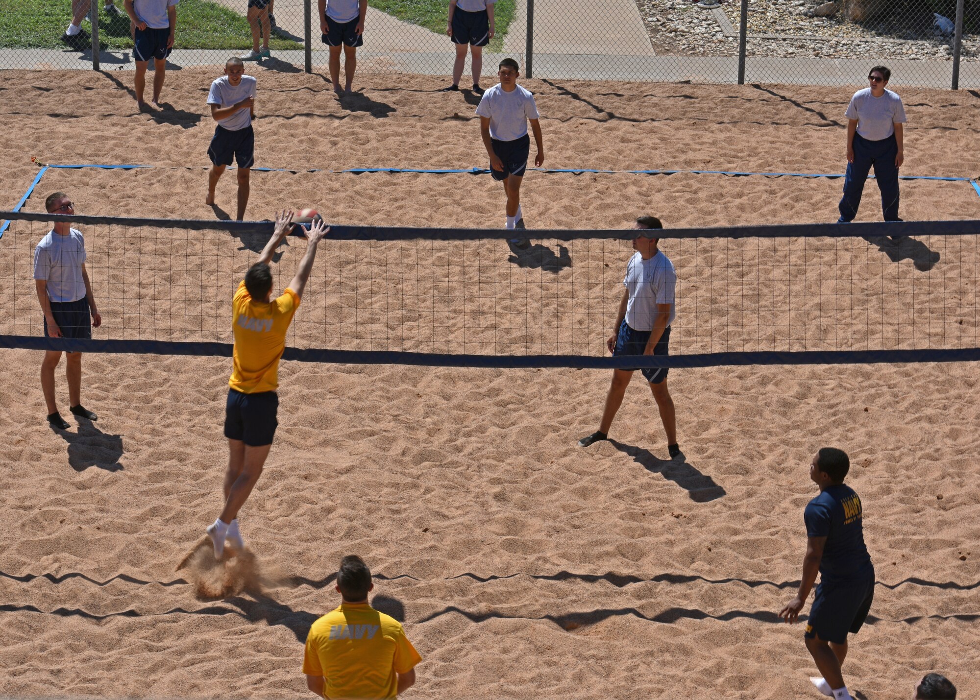 Airmen play volleyball during Wing Sports Day on Goodfellow Air Force Base, Texas, Sept. 17, 2021. Teams competed to earn points for their units in an attempt to win the bracket. (U.S. Air Force photo by Senior Airman Ashley Thrash)