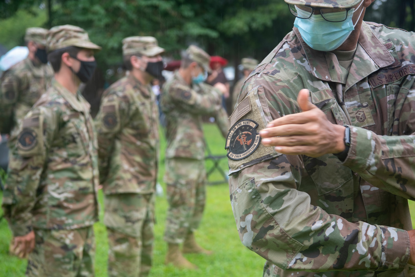 Virginia Air National Guard members from the 185th Cyberspace Operations Squadron ceremoniously removed their 185th COS bat patch, replacing it with the 856th Cyber Protection Team patch during send-off ceremonies Aug. 7, 2021, at Joint Base Langley-Eustis, Virginia.