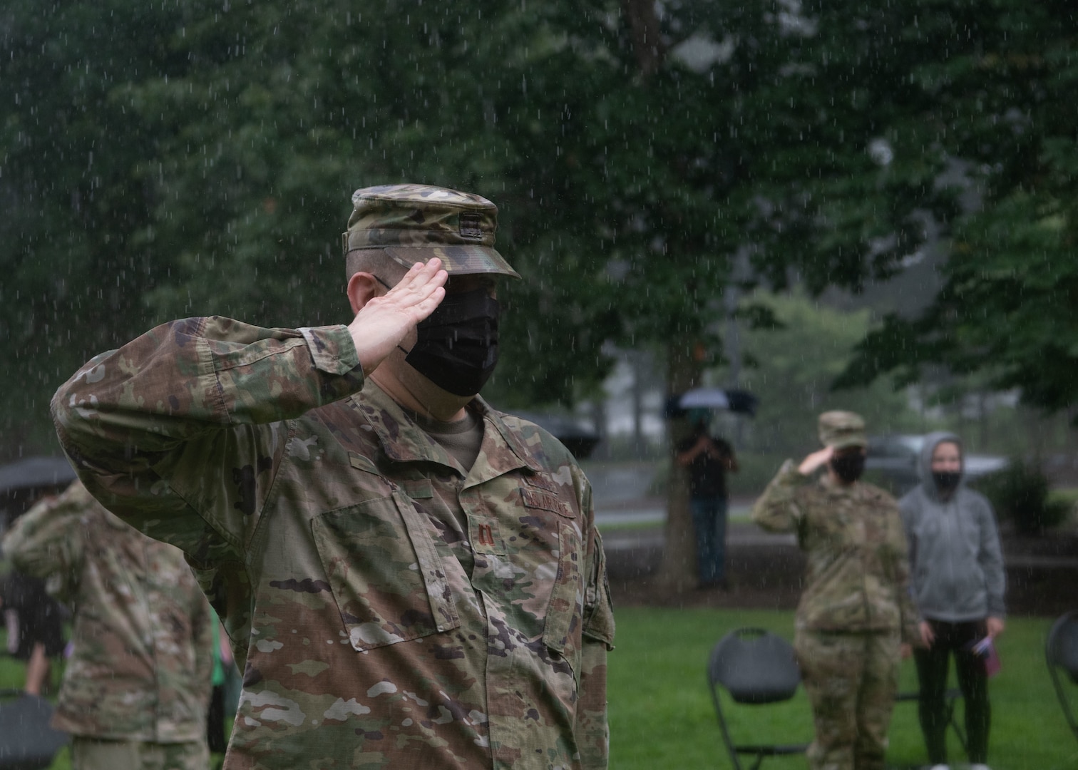 Virginia Air National Guard members from the 185th Cyberspace Operations Squadron celebrate their upcoming mission with family and command leadership during send-off ceremonies Aug. 7, 2021, at Joint Base Langley-Eustis, Virginia.