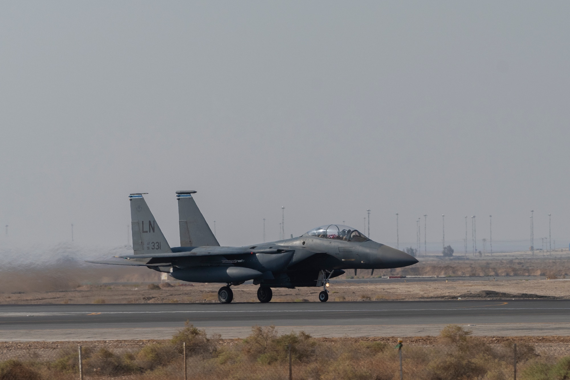 Four F-15E Strike Eagles assigned to the 332nd Air Expeditionary Wing take off in support of Bright Star