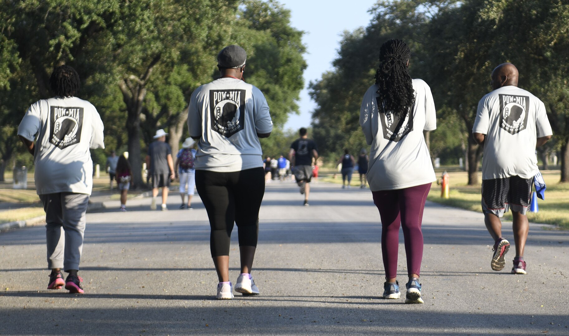 Joint Base San Antonio community members participate in a 5-Kilometer run commemorating Prisoners of War and Missing in Action Recognition Day