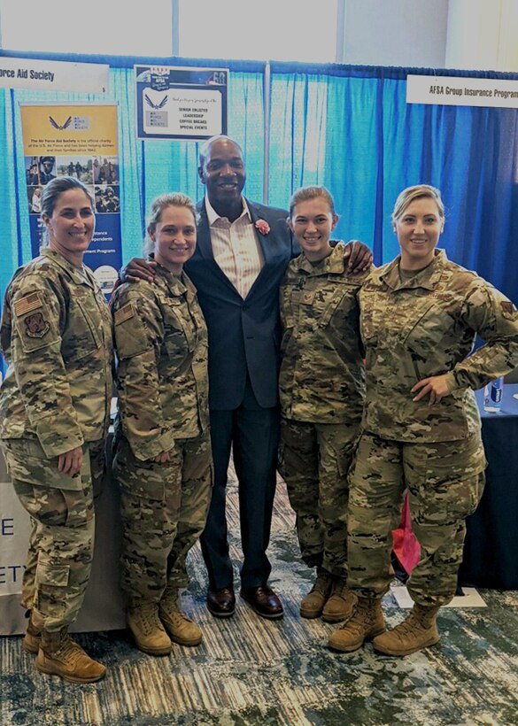 Chief Master Sgt. Laurice Souron, Master Sgt. Jennifer Hartwig, Tech. Sgt. Jaymie White, and Staff Sgt. Sara Kolinski pose for a photo with retired Command Chief Master Sgt. of the Air Force Kaleth O. Wright, 18th CMSAF, at the Air Force Sergeants Association Professional Education and Development Symposium July 26, 2021, in Orlando Florida.  During the symposium the 104th Fighter Wing members met with Air Force senior enlisted leaders and discussed ways that the Air and Space Forces plan to accelerate change.  (U.S. Air National Guard courtesy photo)