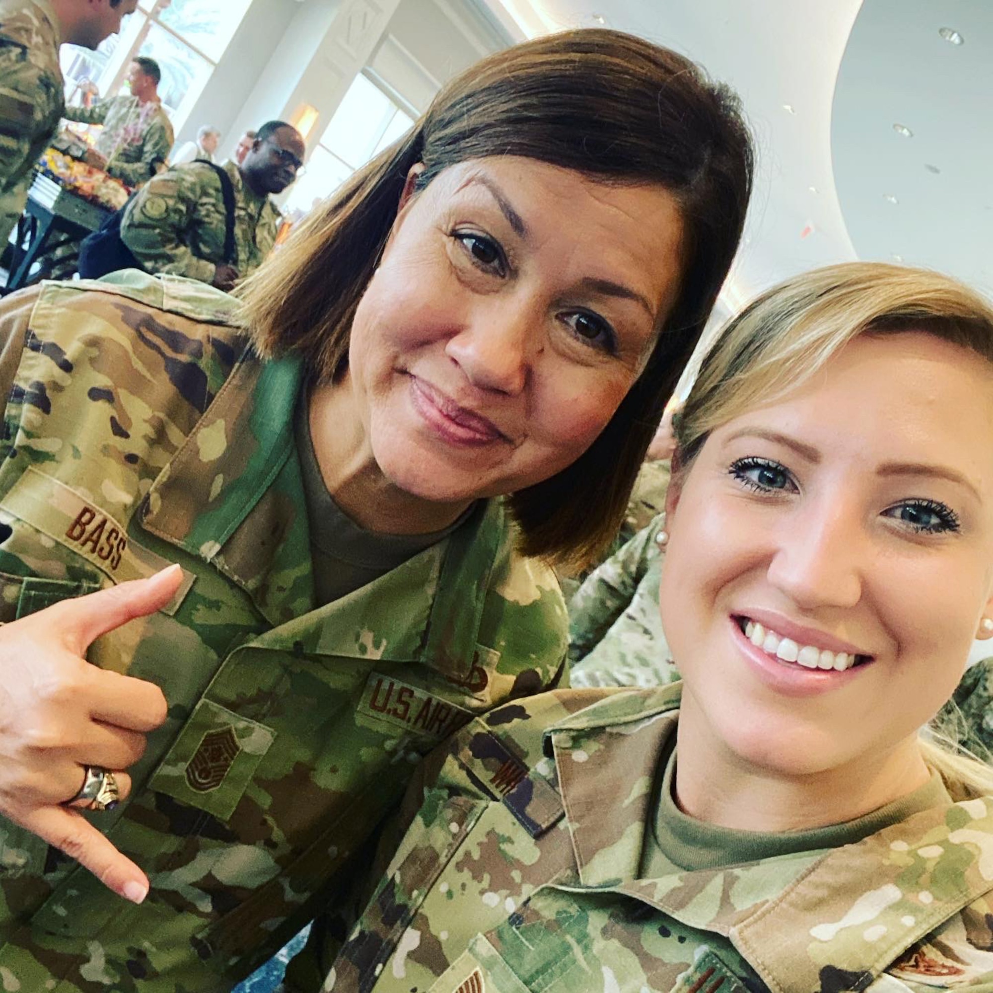 Tech. Sgt. Jaymie White takes a selfie with Command Chief Master Sgt. of the Air Force JoAnne S. Bass, 19th CMSAF, at the Air Force Sergeants Association Professional Education and Development Symposium July 28, 2021, in Orlando Florida.  During the symposium the 104th Fighter Wing members met with Air Force senior enlisted leaders and discussed ways that the Air and Space Forces plan to accelerate change.  (U.S. Air National Guard courtesy photo)