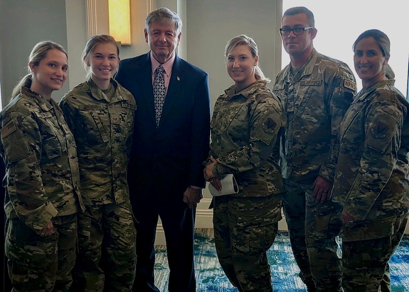 Chief Master Sgt. Laurice Souron, Senior Master Sgt. Jason Ballou, Master Sgt. Jennifer Hartwig, Tech. Sgt. Jaymie White, and Staff Sgt. Sara Kolinski pose for a photo with retired Command Chief Master Sgt. of the Air Force David J. Campanale, 11th CMSAF, at the Air Force Sergeants Association Professional Education and Development Symposium July 26, 2021, in Orlando Florida.  During the symposium the 104th Fighter Wing members met with Air Force senior enlisted leaders and discussed ways that the Air and Space Forces plan to accelerate change.  (U.S. Air National Guard courtesy photo)