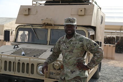 Spc. Stephen Ezenwosu, medic with Headquarters Company, 1st Battalion, 279th Infantry Regiment, 45th Infantry Brigade Combat Team, trains at the National Training Center near Fort Irwin, CA, July 2021. Ezenwosu, of Nigeria, first visited the U.S. in January 2017 and later decided to move to Oklahoma from his home country. He said he joined the Oklahoma Army National Guard as a means to contribute to society and achieve his dream of becoming a U.S. citizen.  Ezenwosu became a U.S. citizen on April 16, 2021. He currently attends Tulsa Community College and studies nursing.  (Oklahoma Army National Guard photo by Spc. Caleb Stone)