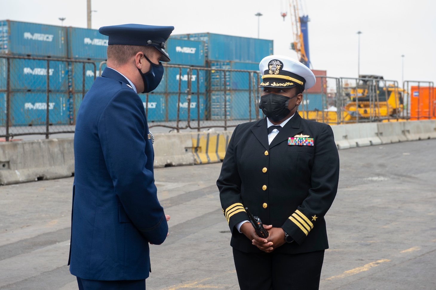 Cmdr. Ernique Sesler, executive officer, USS Hershel "Woody" Williams, right, speaks with Lt. Col. William Lange, defense attache, U.S. embassy in Windhoek, Namibia, before a tour of the Expeditionary Sea Base USS Hershel "Woody" Williams (ESB 4), Sept. 17, 2021.