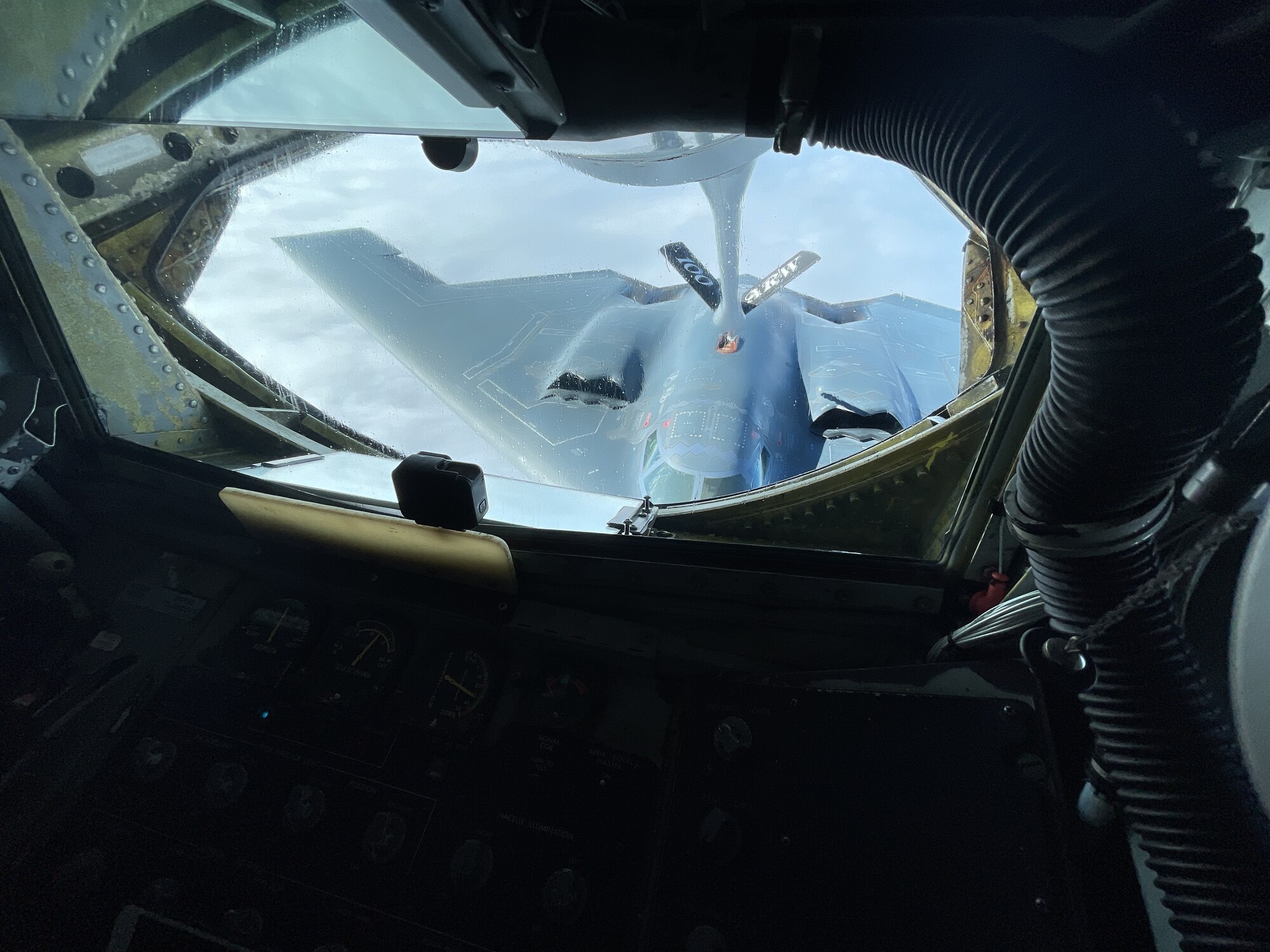 A U.S. Air Force B-2 Spirit aircraft assigned to the 509th Bomb Wing, Whiteman Air Force Base, Missouri, receives fuel from a KC-135 Stratotanker aircraft assigned to the 100th Air Refueling Wing, Royal Air Force Mildenhall, England, over Europe during a bomber task force mission Sept. 8, 2021. Strategic bomber missions familiarize aircrew with air bases and operations in different geographic combatant commands’ areas of operation. (U.S. Air Force photo by Senior Airman Joseph Barron)