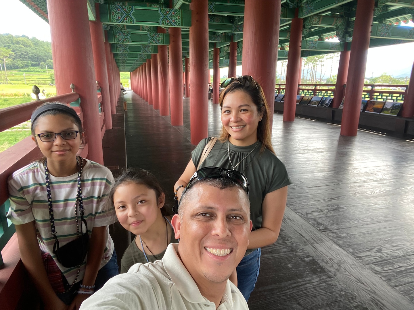 Jose Medina, his wife Pia, and two of his five children