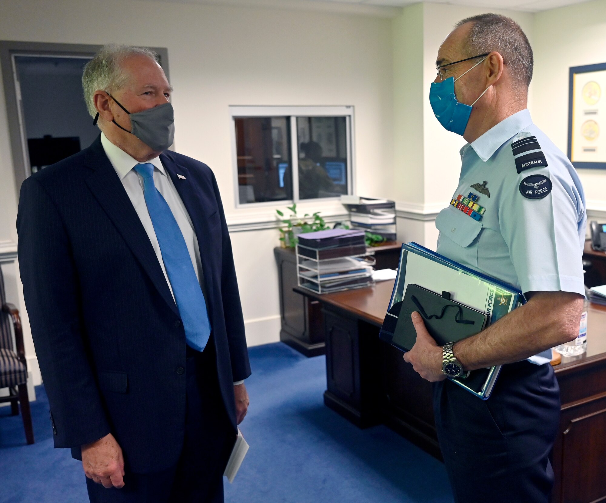 Secretary of the Air Force Frank Kendall speaks with Air Marshal Melvin Hupfeld