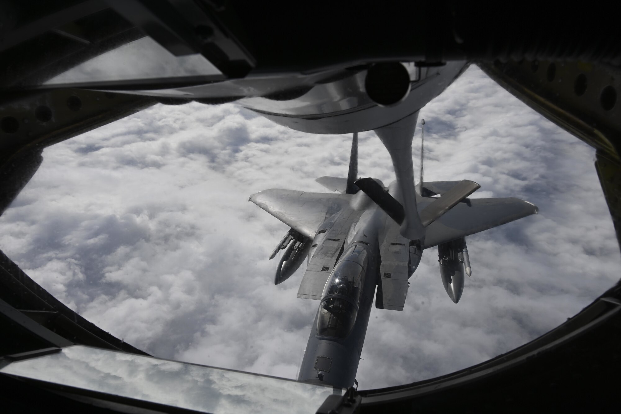A U.S. Air Force KC-135 Stratotanker aircraft assigned to the 100th Air Refueling Wing, Royal Air Force Mildenhall, England, refuels a F-15C Eagle aircraft assigned to the 48th Fighter Wing, RAF Lakenheath, England, during exercise High Life over the North Sea, Sept. 15, 2021. The complexity of the European continent and the tyranny of proximity makes operating with allies and partners throughout Europe an imperative. (U.S. Air Force photo by Senior Airman Joseph Barron)
