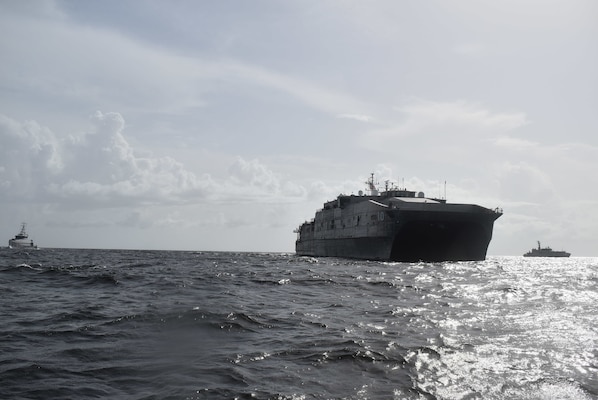 he Spearhead-class expeditionary fast transport ship USNS Burlington (T-EPF-10) conducts a maritime interdiction exercise with Trinidad and Tobago Coast Guard patrol ships TTS Carli Bay (CG 28) and TTS Scarborough (CG 42), Sept. 15, 2021.