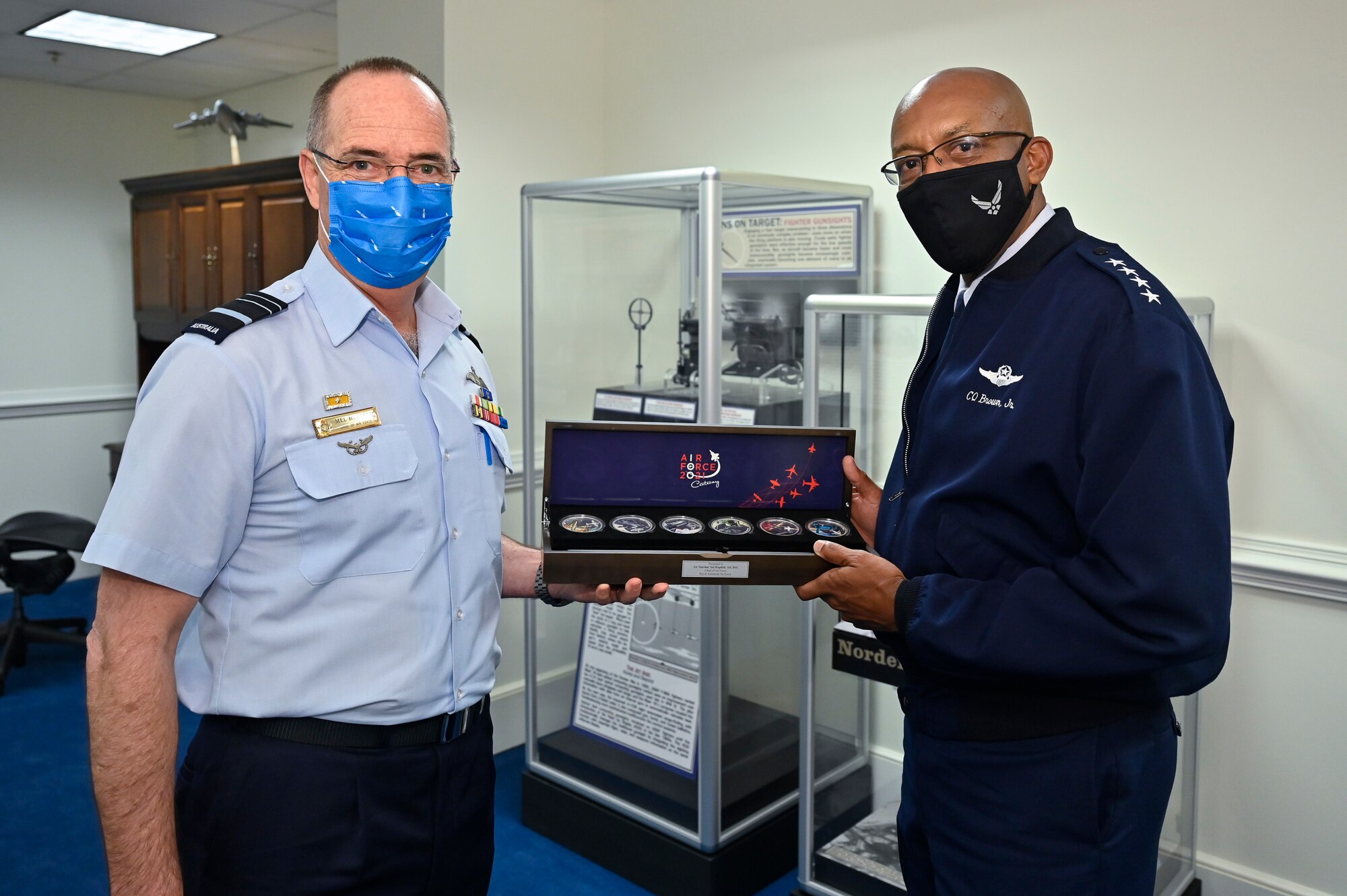 Air Force Chief of Staff Gen. CQ Brown, Jr., right, poses with Air Marshal Melvin Hupfeld