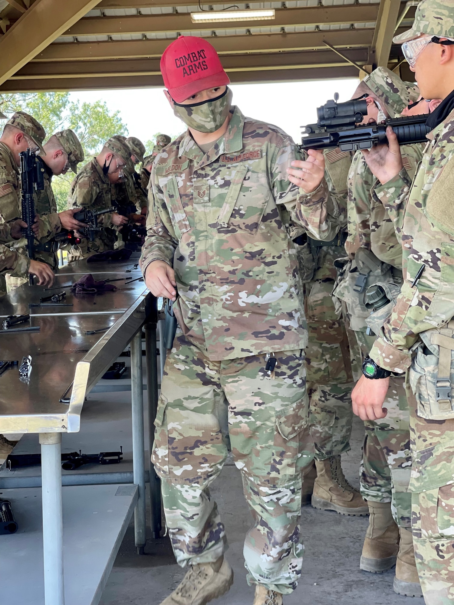 CATM instructor inspects trainees' weapons