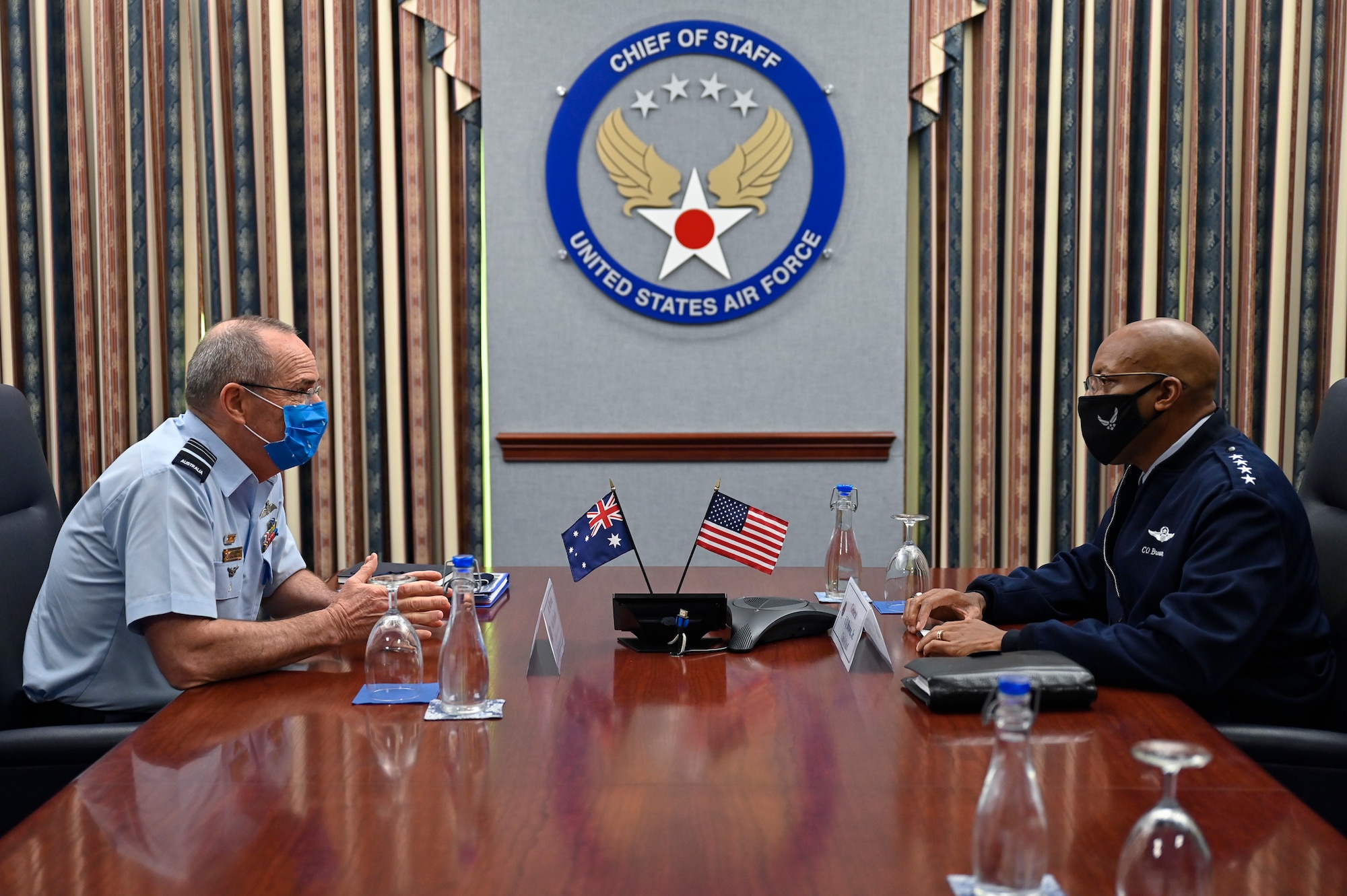 Air Marshal Melvin Hupfeld, left, chief of the Australian air force, speaks with Air Force Chief of Staff Gen. CQ Brown, Jr. during a meeting